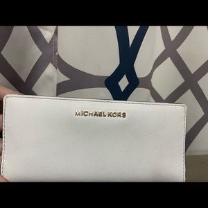 Michael kors wallet and pink purse